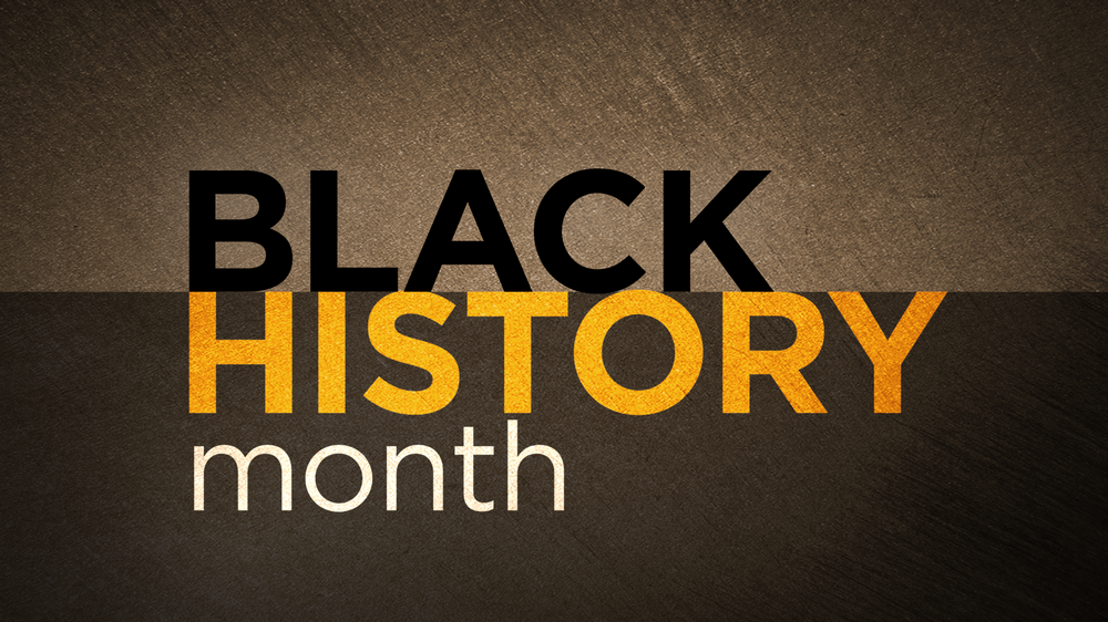 •	Colorful sign that reads Black History Month
